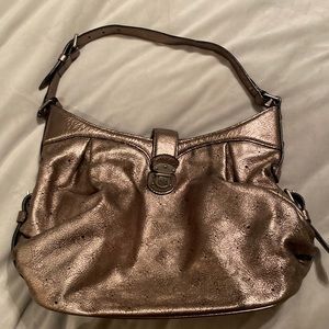 Louis Vuitton Mahina XS in bronze EUC